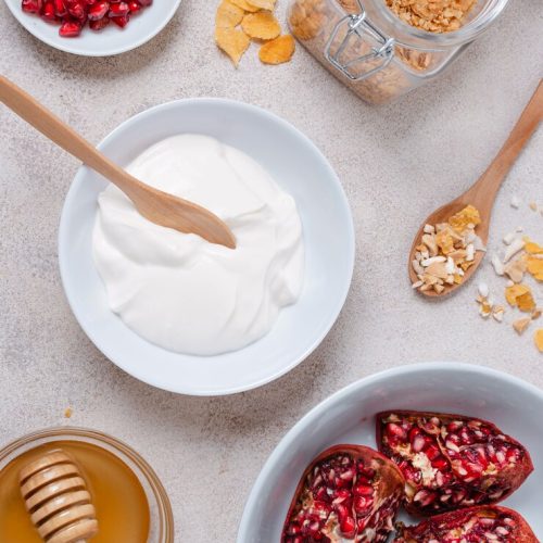 healthy-breakfast-with-pomegranate-yogurt_23-2148529496